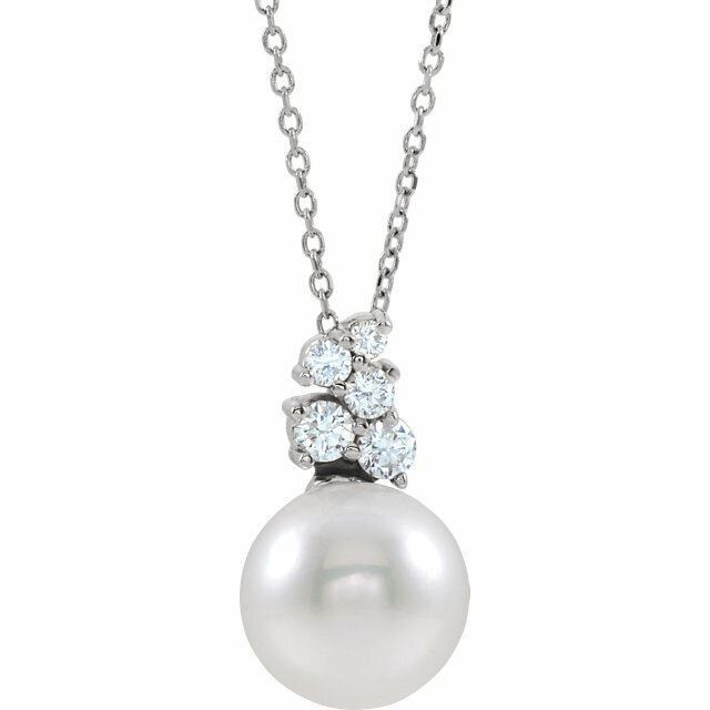 Our highest-quality Freshwater cultured pearl is paired with five brilliant round diamonds and attached to an 14k white gold bail. The pair suspend from a delicate 14k white gold 16-18" cable chain. Diamonds are G-H in color and I1 or better in clarity. 