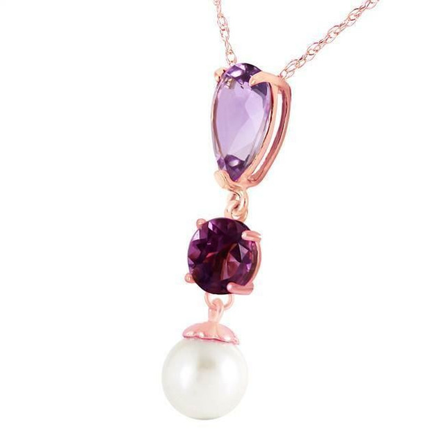  Necklaces are a fun way to dress up any outfit, and with the beauty of gold, amethyst, and natural pearls, this piece can enhance any look. On this 14k solid gold necklace with purple amethyst and pearl, the bright color of amethyst is only made brighter with the pure white of the dangling 2.5 carat pearl. 2.75 carats of stunning purple amethyst are suspended from an 18 inch long rope chain, allowing it to fall naturally when it is worn. This piece is an elegant piece that can accessorize any ensemble beautifully.
