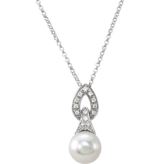 Modern yet classic, this pendant features thirteen brilliant diamonds contrasted beautifully with a single 8mm freshwater cultured pearl. This necklace is finished with a delicate 14k white gold cable chain. 