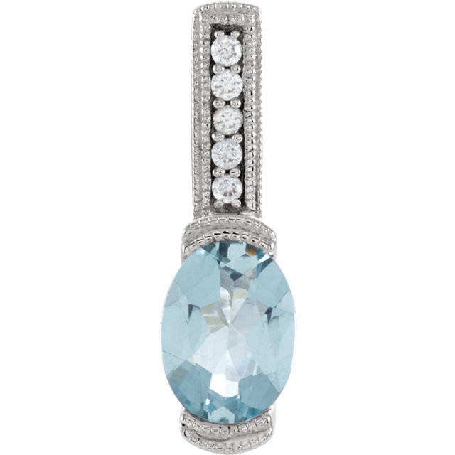 This elegant pendant necklace features a 8x6mm genuine natural light blue aquamarine accented with diamonds, all beautifully set in a 14kt white gold.