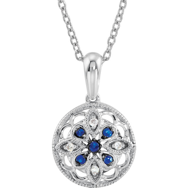 5 Round Blue Sapphire Gemstones Are Artfully Arranged in a Finely Wrought Sterling Silver Medallion Charm in This Pendant. 4 Diamond Accents Add Sparkle.