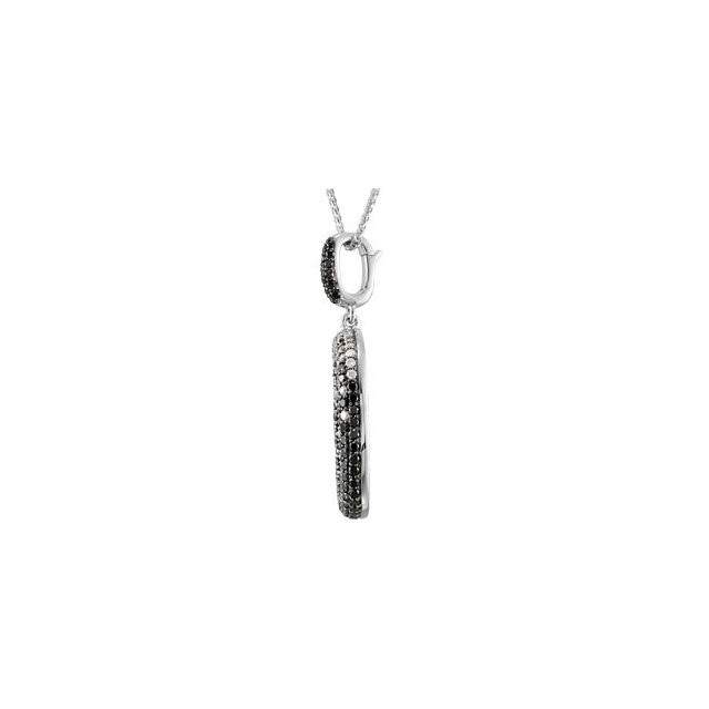 This unique 14k white gold pendant features diamonds and black diamonds for a total carat weight of 1 3/4ct. Diamonds are H-I in color and I1 or better in clarity. Black diamonds are irradiated to achieve color.