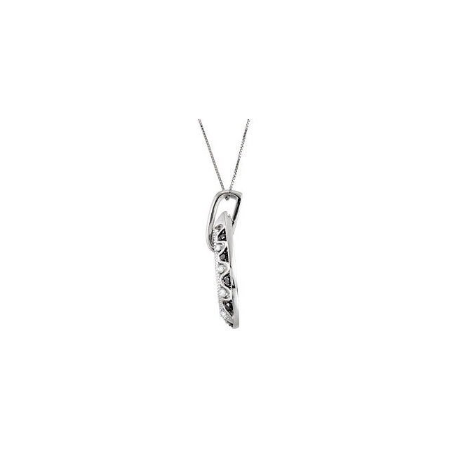 This unique 14k white gold pendant features diamonds and black diamonds for a total carat weight of 1/2ct. Diamonds are H+ in color and I1 or better in clarity. Black diamonds are irradiated to achieve color. 