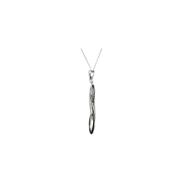 From the Twinkling Diamond collection, this 14k white gold teardrop pendant features a floating 1 1/3 ct diamond accented by black round diamonds and round diamonds. Diamonds are G-I in color, and I in clarity. Black diamonds have been treated to achieve color. Pendant is 57mm in length, 18mm in width, and is displayed on an 18inch chain.