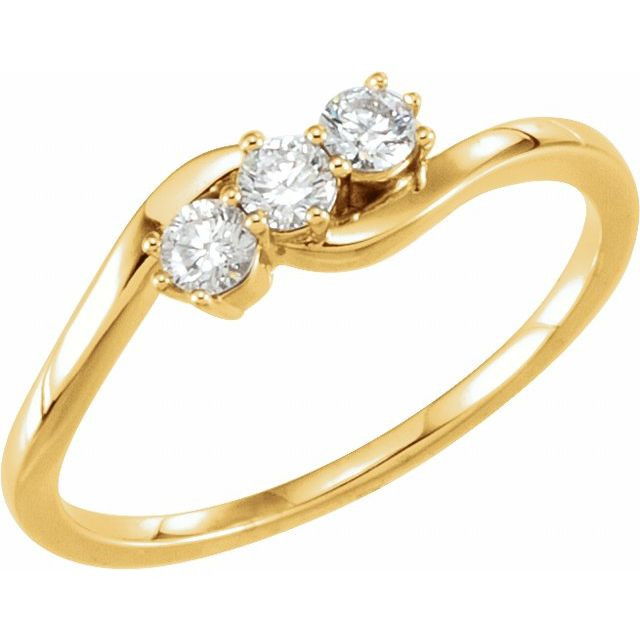 A three-stone ring, also known as a trilogy or trinity ring, symbolizes the past, present, and future of a relationship. The center stone represents the present, while the side stones represent cherished memories from the past and the promise of a future together.