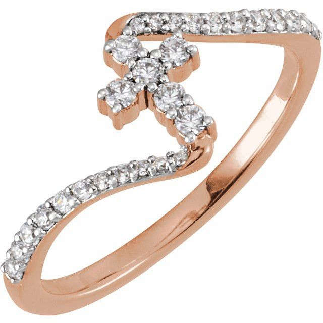 Faith meets fashion in this diamond cross ring.
