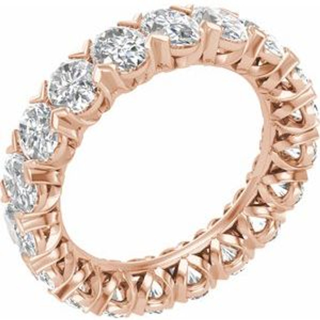 As bold as your love, this diamond eternity band adds sparkle to your celebration.