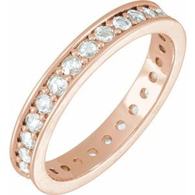 As bold as your love, this diamond eternity band adds sparkle to your celebration.