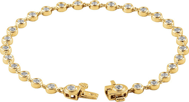 A thoughtful look just for her, this gorgeous diamond bracelet is a winner all around. Crafted in 14K Yellow Gold, this stunning style features 29 round diamonds each with a color ranking of H+ and a clarity of I1. Sparkling with 2 ct. t.w. of round diamonds, this 7.0-inch circumference secures with a tongue and groove clasp.
