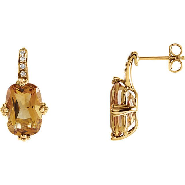 Elegant and dramatic, these captivating drop earrings are a statement look any woman would adore. Fashioned in 14K yellow gold, each earring showcases a 12.00x08.00mm citrine gemstones. The drop is adorned with shimmering diamond accents and polished to a fine shine, making this romantic gift the perfect birthday surprise.