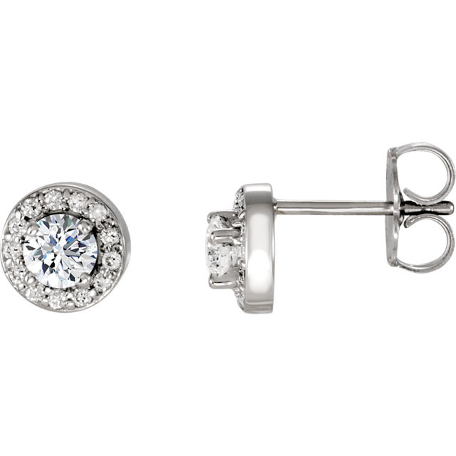 Dazzling diamonds are always an excellent choice and she'll absolutely adore these delightful studs. Fashioned in 14K white gold, each earring showcases a beautiful round diamond center stone surrounded by a double frame of smaller accent diamonds. Sparkling with 3/8 ct. t.w. of diamonds and finished with a bright polish, these post earrings secure comfortably with friction backs.