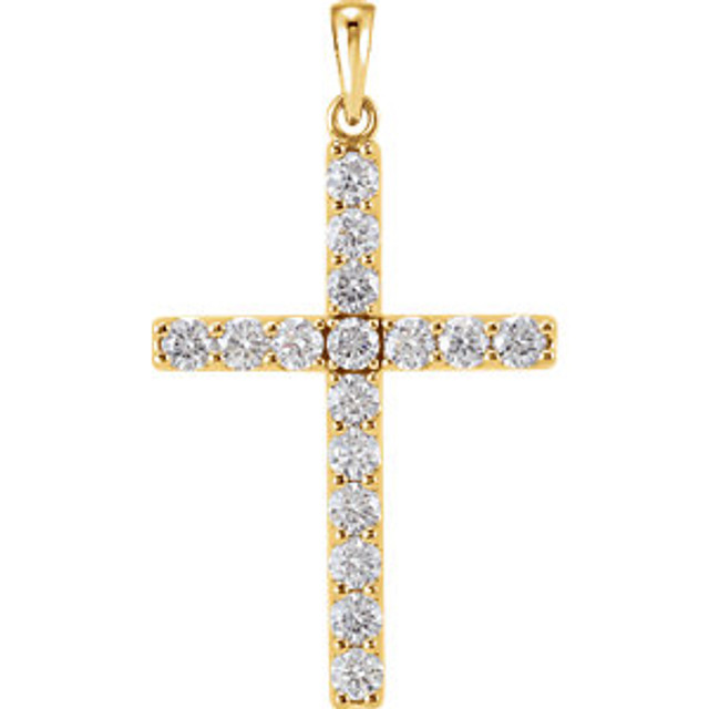 Sixteen brilliant-cut round diamonds are beautifully set in a sparkling prong setting in this stunning diamond cross pendant in 14k yellow gold.