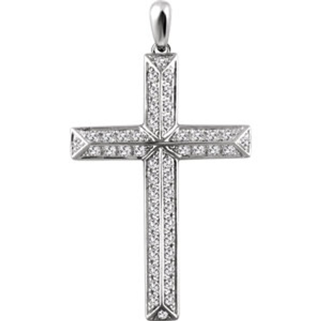 Simple and stylish, this cross pendant is a sparkling reflection of her faith. Crafted in cool 14K white gold, this traditional cross is outlined with shimmering diamond accents that catch the light. A classic look she's certain to adore, this cross is polished to a brilliant shine. 