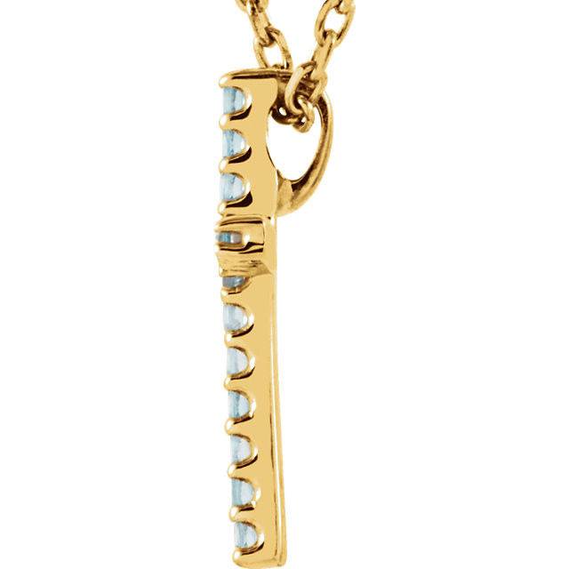 Inspiring and eye-catching, this sparkling Genuine Aquamarine pendant showcases beautiful 14k yellow gold and matching 16" diamond cut cable chain necklace.