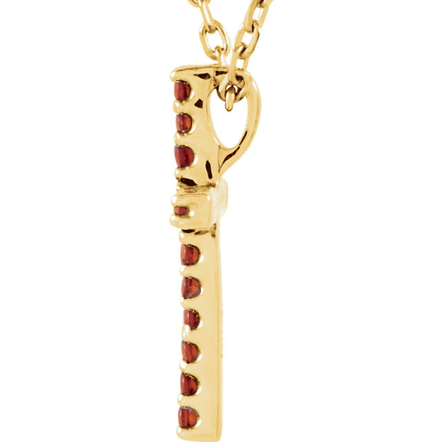 Prong set with 17 genuine garnet mozambique stones, this Cross Pendant is a lovely symbol of your devotion and faith. Set in 14K yellow gold, the pendant hangs from a 16" cable chain.
