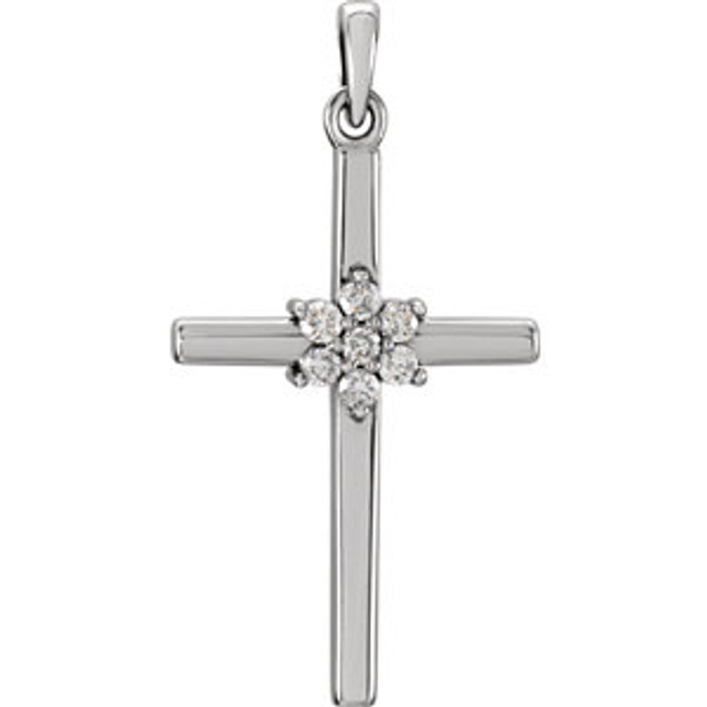 Diamond cross pendant in 14k white gold measures 26.46x13.80mm and radiant with 1/10 ct. tw. Polished to a brilliant shine.