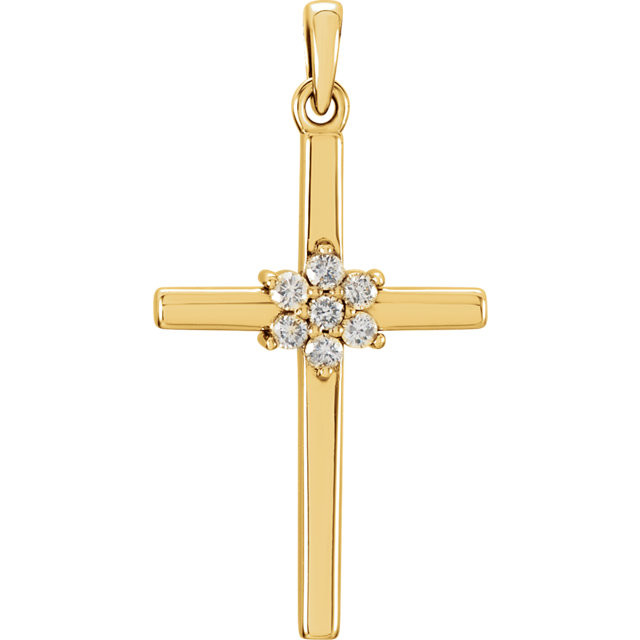 Diamond cross pendant in 14k yellow gold measures 26.46x13.80mm and radiant with 1/10 ct. tw. Polished to a brilliant shine.