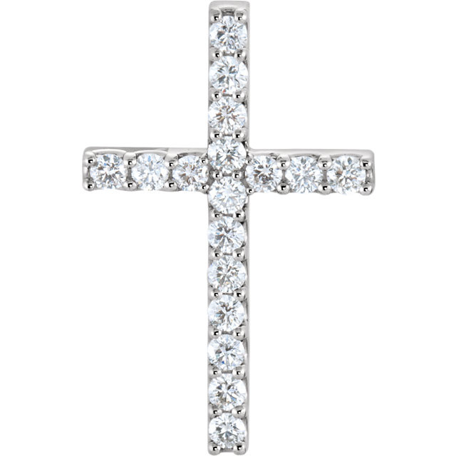 Diamond cross pendant in 14K white gold totaling 1.00 ct. tw. Diamonds are G-H in color and I1 or better in clarity. Polished to a brilliant shine. 