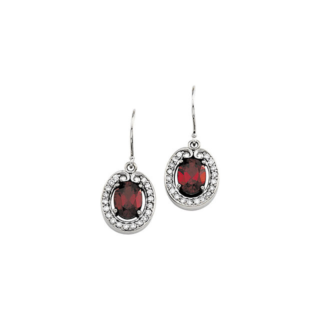 Mozambique Garnet & Diamond Earrings In 14k Yellow Gold measures 08.00x06.00mm in this perfectly essential pair of earrings.