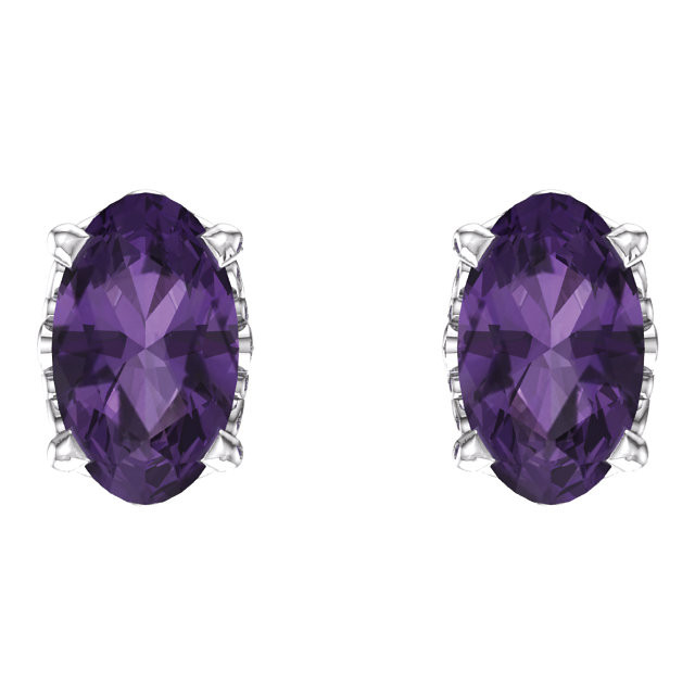 Purple passion! This simple stud design features a 5 x 3mm faceted genuine amethyst cradled in a 4-prong basket of 14k white gold finished with a tension back post. Total carat weight for the pair is 0.44. Color range varies on all natural stones so please allow for slight variations in shades. Gemstone treatment: heat enhanced.