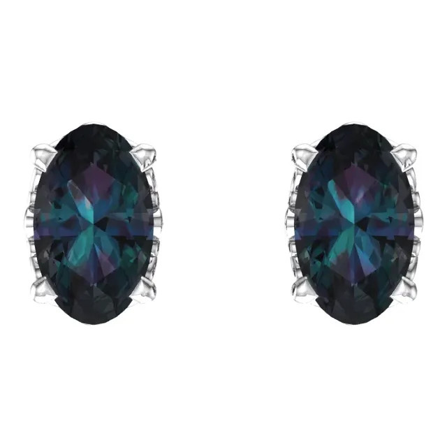 The changing hues of an Alexandrite stone enchants the eye and fuels the imagination. It is perfect for those seeking a unique expression of self. This simple stud design features a 5x3mm Lab-Grown Alexandrite cradled in a 4-prong basket of 14k white gold finished with a tension back post.
