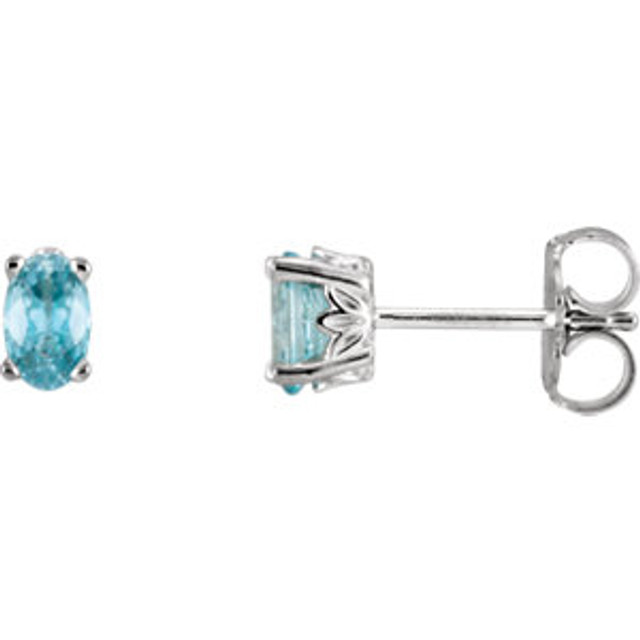 The aqua-blue brightness of Zircon often tinged with shimmering teal gives energy and renewal to those who discover this often overlooked gem. This simple stud design features a 5 x 3mm genuine blue zircon cradled in a 4-prong basket of 14k white gold finished with a tension back post. Total carat weight for the pair is 0.74. Gemstone treatment: traditional heated process.