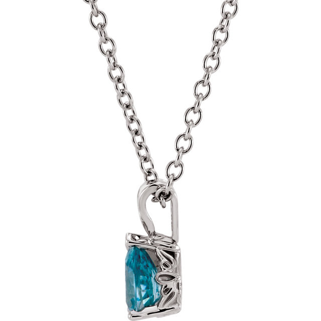 This enchanting 14k white gold pendant features a 7x5mm genuine pear cut blue zircon and is polished to a brilliant shine. 