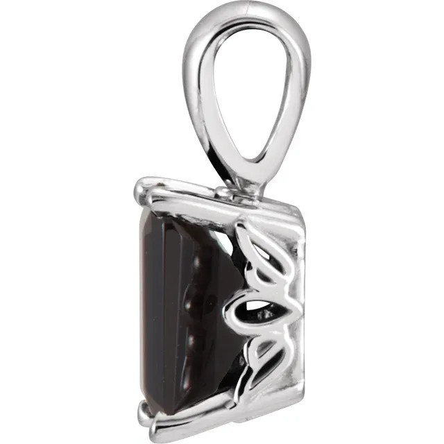 A stunning emerald-cut onyx gemstone glimmers at the center of this elegant pendant for her.