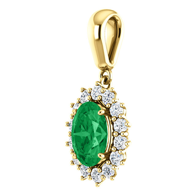 A stunning Chatham® Created emerald is surrounded by fourteen round diamonds in this classic pendant.