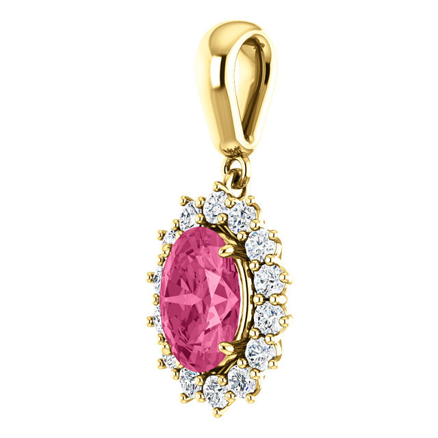 Color-rich and sparkling, this gemstone and diamond pendant features a brilliant pink genuine tourmaline surrounded by sparkling diamonds that are set in 14k yellow gold with a matching cable chain necklace.