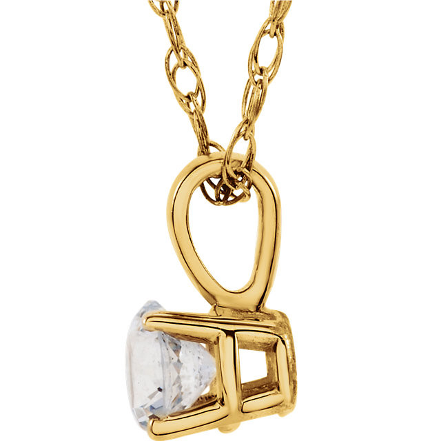 This breathtaking pendant features a 3mm round shaped genuine white sapphire, set in 4 prong 14kt yellow gold. Also available with other gemstones.