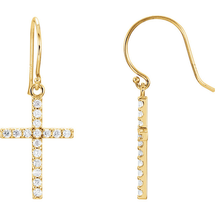 Celebrate faith. The sparkle of this cross pendant emits radiance through prong-set diamonds totaling 1/2 ct. tw. A traditional symbol set in 14K yellow gold.