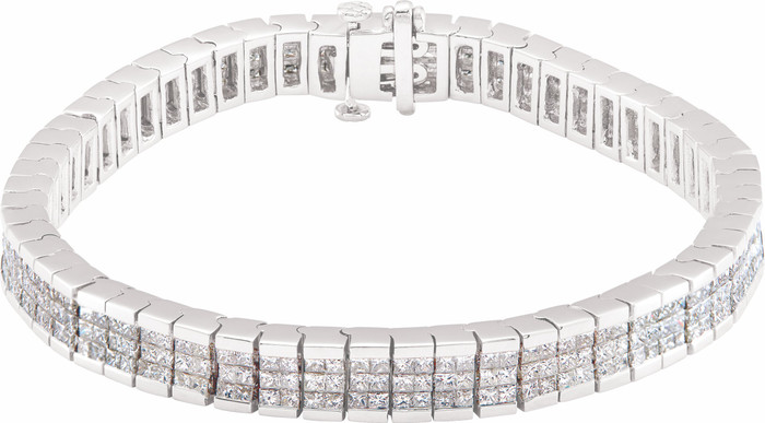 This fabulous 8 3/8 ct. t.w. diamond tennis bracelet is a breathtaking piece that we really love. Sparkling and sensational, it's a classic that features a stream of square princess diamonds so gorgeous that it will have heads turning for a second look. 14kt white gold bracelet.