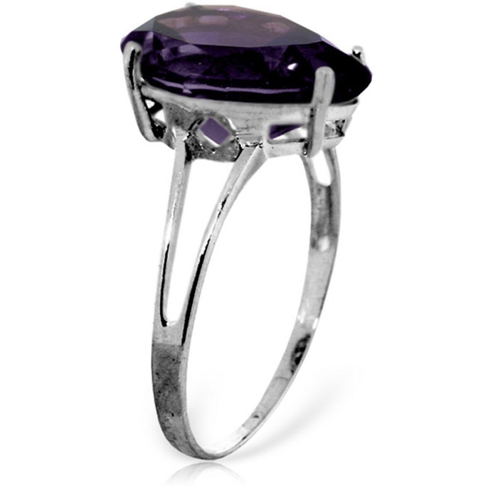 Look radiant every time you put on this 14k gold ring with natural purple amethyst. A beautiful gold band delicately encircles the finger, with an open design crafted of your choice of 14k yellow, white, or rose gold that makes this ring look more unique. One pear cut amethyst stone is put on display in a dazzling way, weighing five full carats to fully show off its beauty to anyone who sees it. This ring is an amazing piece that is easy to wear to add a trendy and colorful accessory to any ensemble. It is also a wonderful birthstone ring for those born in February.