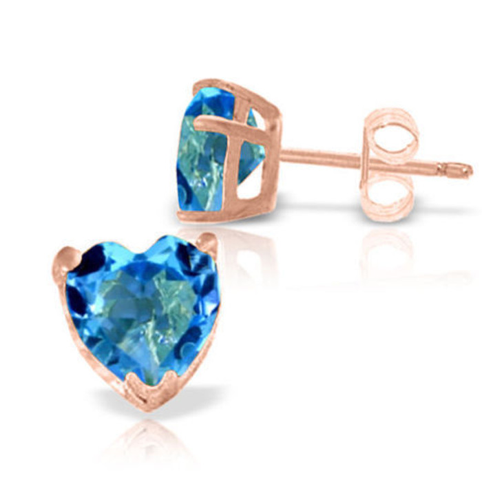 Looking for the perfect gift for that loved one celebrating their birthday in December? Look no further than these stunning 14k solid gold stud earrings with natural blue topaz. The beautiful and bright stone of December is showcased brilliantly while adding subtle elegance to any ensemble. Two stunning natural stones add over three carats of dazzling sparkle to the earlobes, while the beautiful heart shape is a feminine look that every woman will love. The prongs and post are made of high quality 14k solid gold to give them a rich and elegant look, while friction push backs hold them delicately in the earlobes.