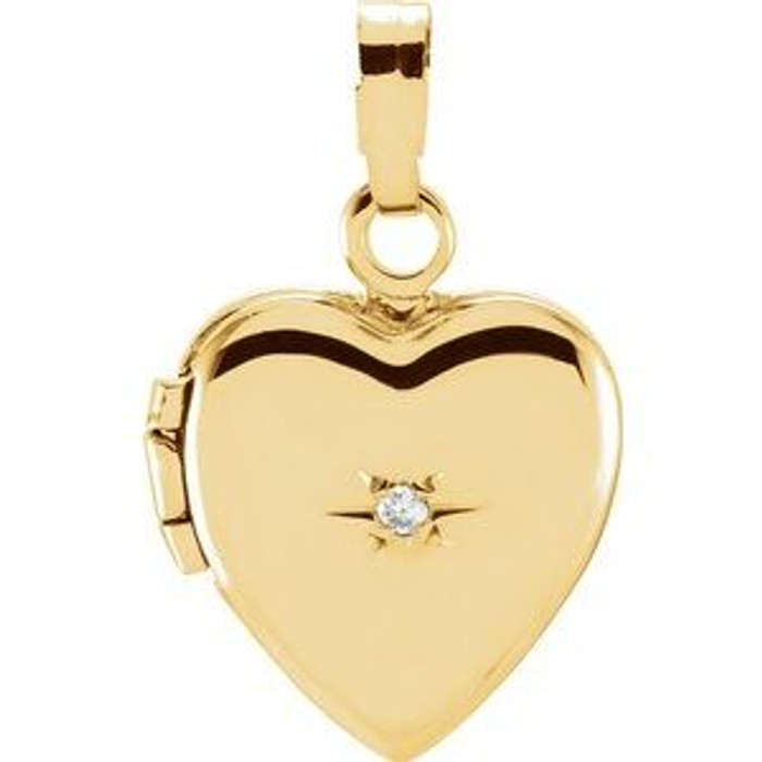 She holds the ones she loves close to her heart. Celebrate that love with this classic heart locket. Fashioned in 14K Yellow Gold, this beautiful heart-shaped locket opens to reveal space for a small photo or memento.