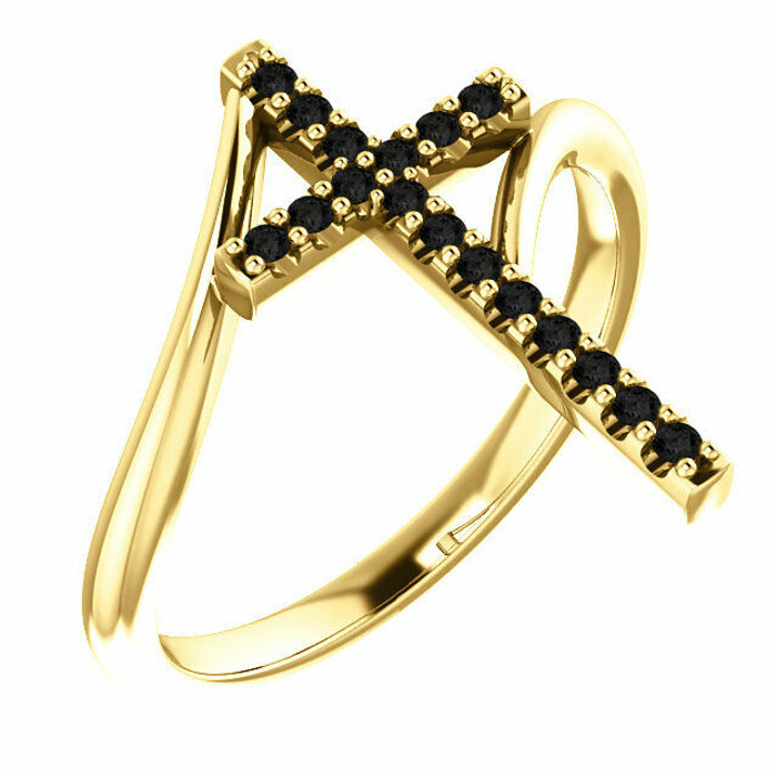 Express your faith with this 14k yellow gold cross ring that is accented with seventeen black diamonds for a bold look. Certain to become a treasured favorite, this ring captivates with 1/8 ct. t.w. of diamonds and a polished shine.