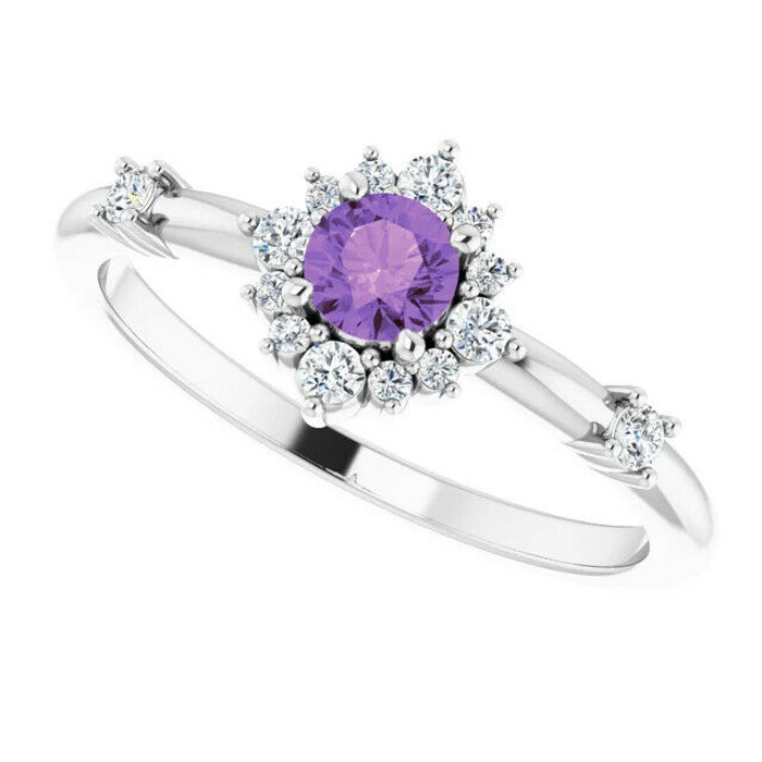 Marvel her with the details of this gorgeous gemstone and diamond ring.