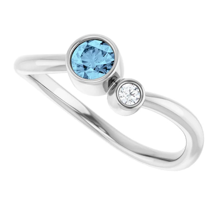 Dainty and feminine, this gemstone ring sets an elegant tone. The ring is set in platinum.