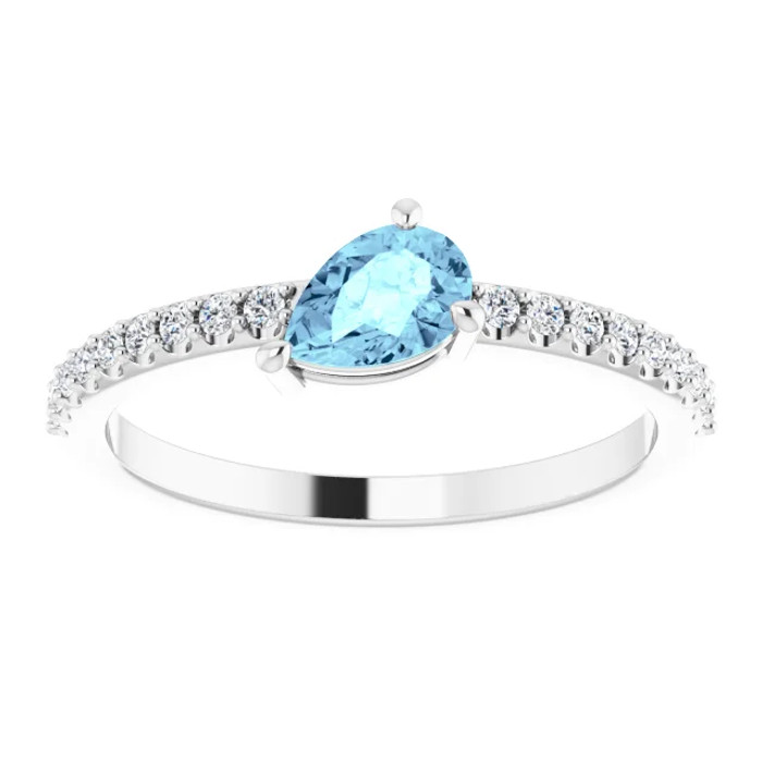 Dainty and feminine, this gemstone ring sets an elegant tone. The ring is set in platinum.