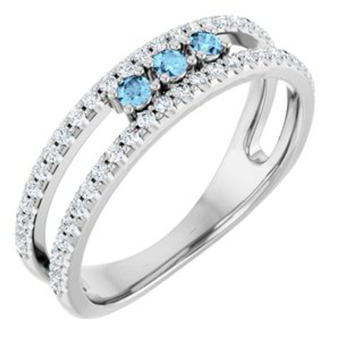 Dainty and feminine, this gemstone ring sets an elegant tone. The ring is set in platinum.