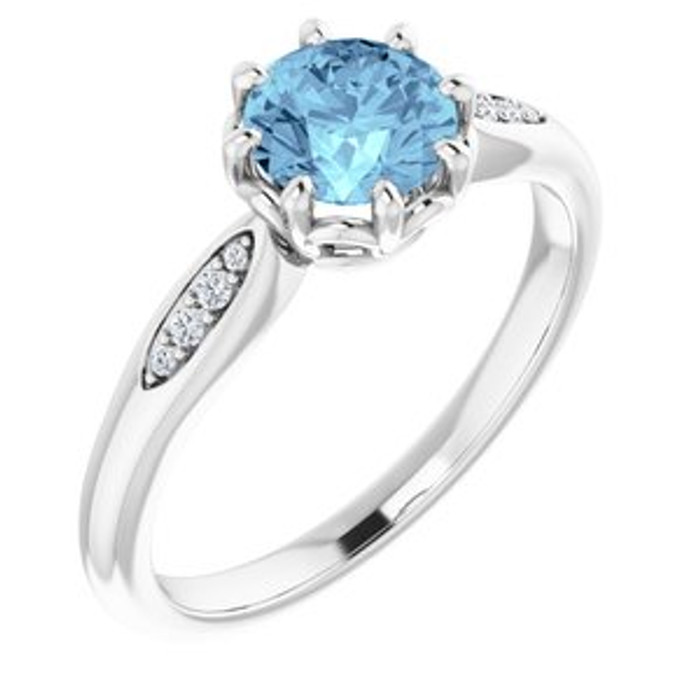 Dainty and feminine, this gemstone ring sets an elegant tone. The ring is set in platinum.