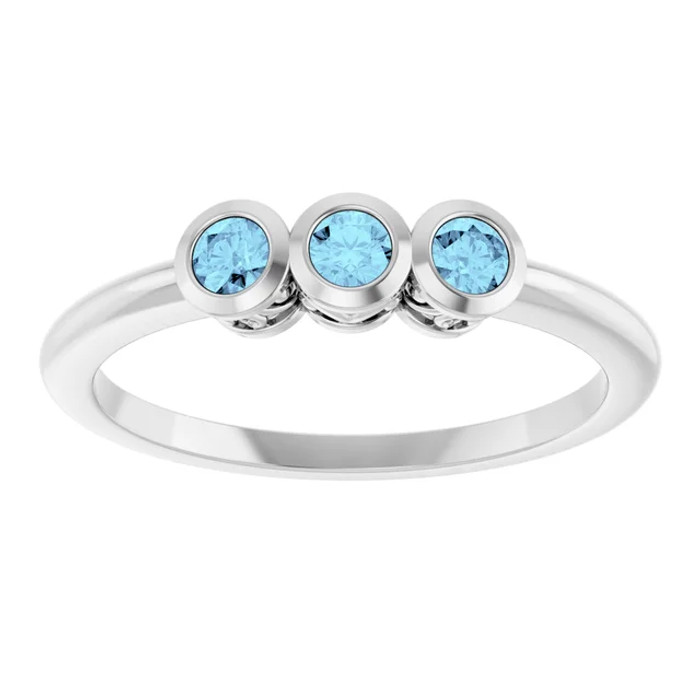 Dainty and feminine, this gemstone ring sets an elegant tone. The ring is set in platinum.