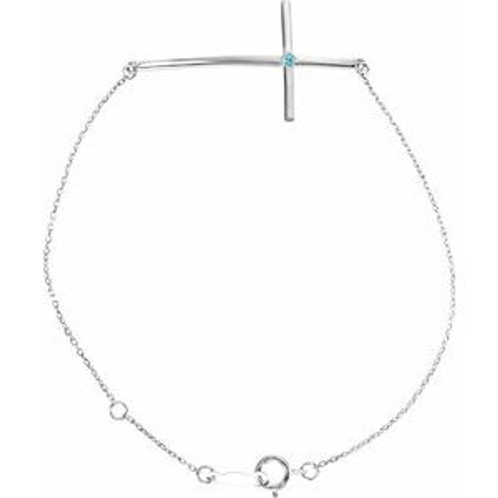 Symbolize your Christian faith with this blue zircon sideways cross bracelet in Platinum.