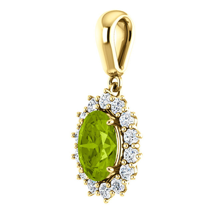 Elegant in every way, this peridot and diamond pendant features a single peridot framed by fourteen round diamonds in 14k yellow gold with a matching cable chain necklace.