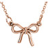 Knotted Bow 18" Necklace In 14K Gold measures 21.00x19.25mm and has a bright polish to shine.