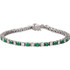 This 14kt white gold bracelet features twenty three 3mm genuine and natural green emeralds accented by 23 brilliant cut round near-colorless diamonds of G-H Color and I1 Clarity. The colored precious gemstones and shiny diamonds are set in a prong setting.