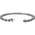 This platinum bracelet features twenty three 3mm genuine and natural green emeralds accented by 23 brilliant cut round near-colorless diamonds of G-H Color and I1 Clarity. The colored precious gemstones and shiny diamonds are set in a prong setting.