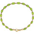 Brilliant oval genuine peridot gemstones set in 14k yellow gold in this eye-catching bracelet.