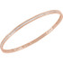Elegant 14Kt rose gold diamond stackable bangle 7.5" bracelet featuring a sparkling display of white round diamonds. Total weight of the diamonds is 2 1/4cts. Total weight of the gold is 8.99 grams.